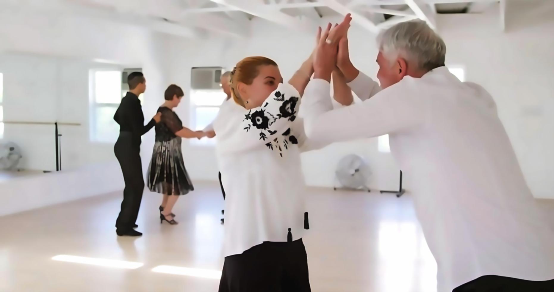 Dance students practicing in a welcoming studio environment
