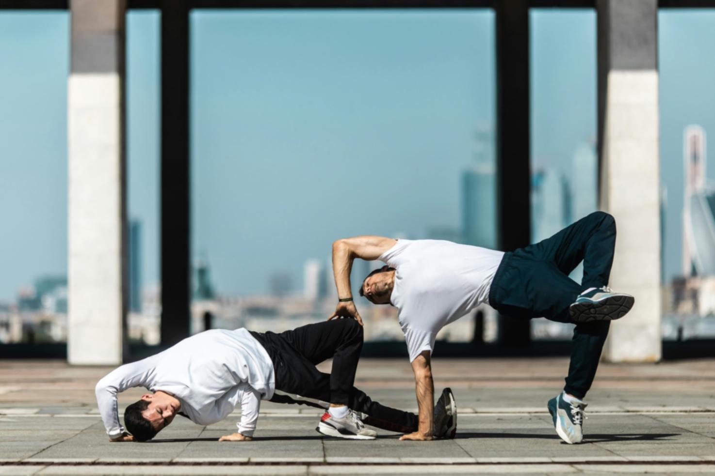 Dance students practicing together in natural lighting